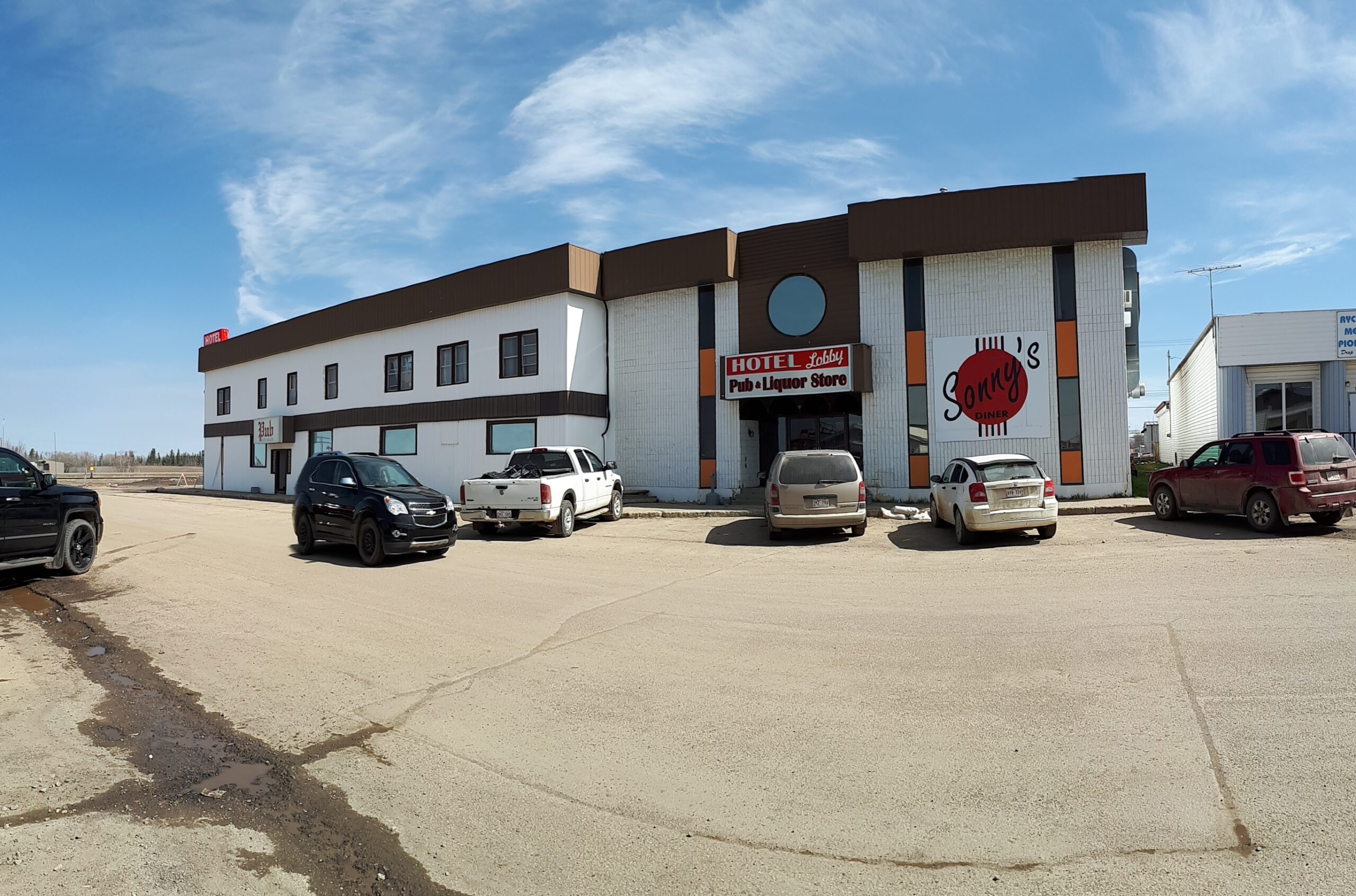 Rycroft Inn building with cars in parking lot